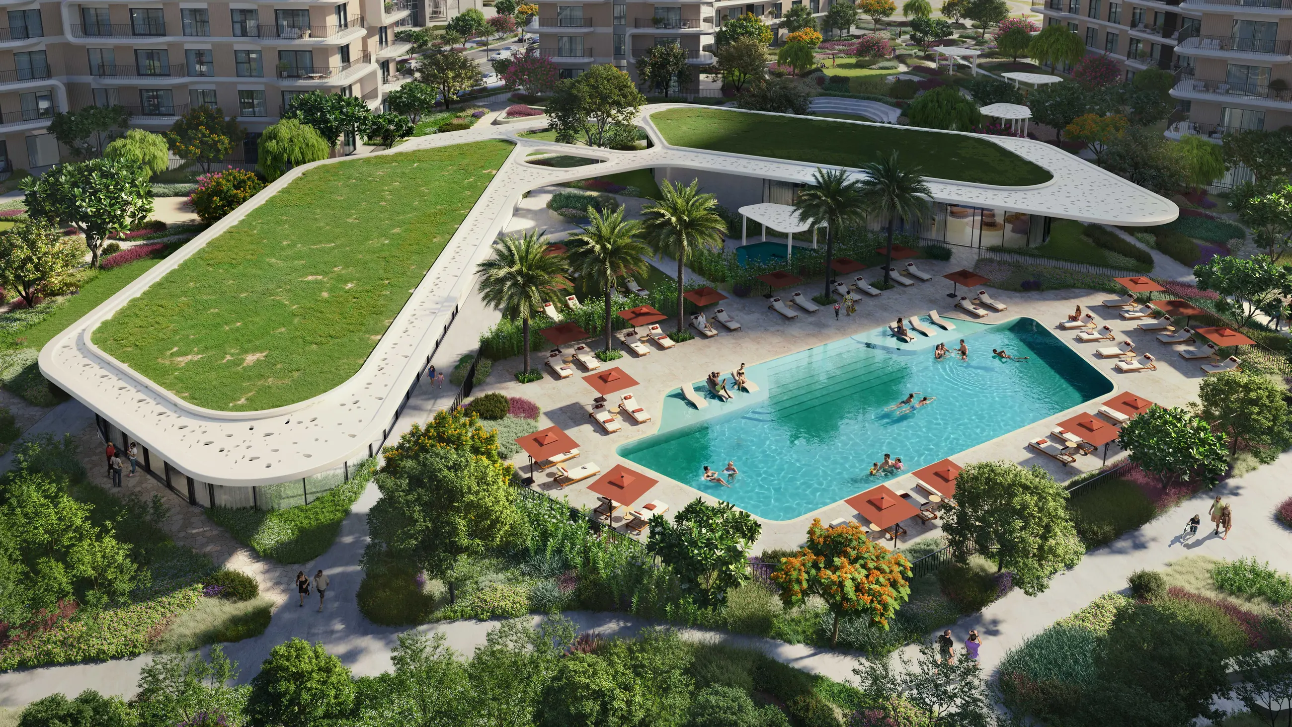 Aerial view of the Yas Park Place community, showing the sculpted lawn, community pool and pavilion set among the six mid-rise residences