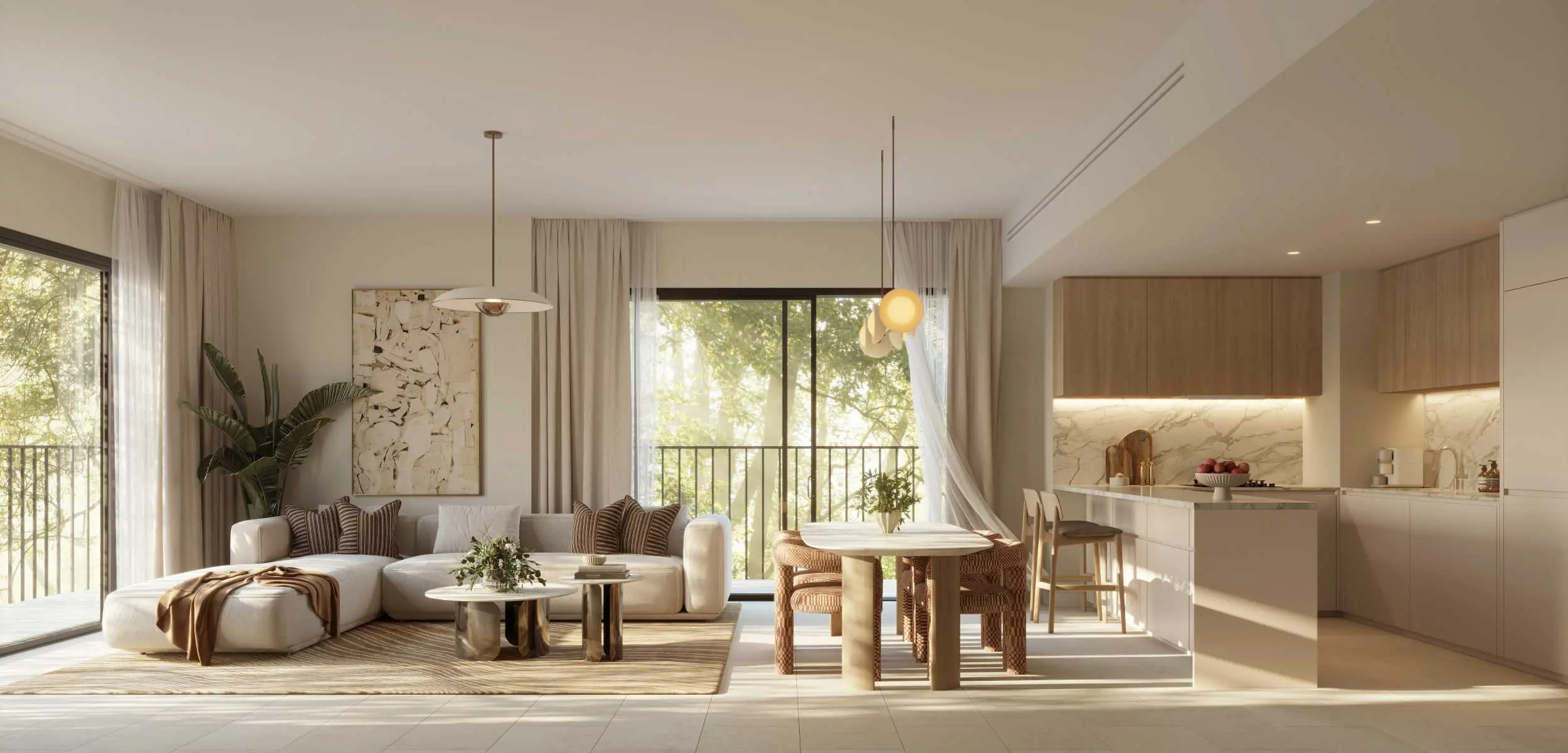 Alternate view of an open living, dining and kitchen space in a Yas Park Place residence